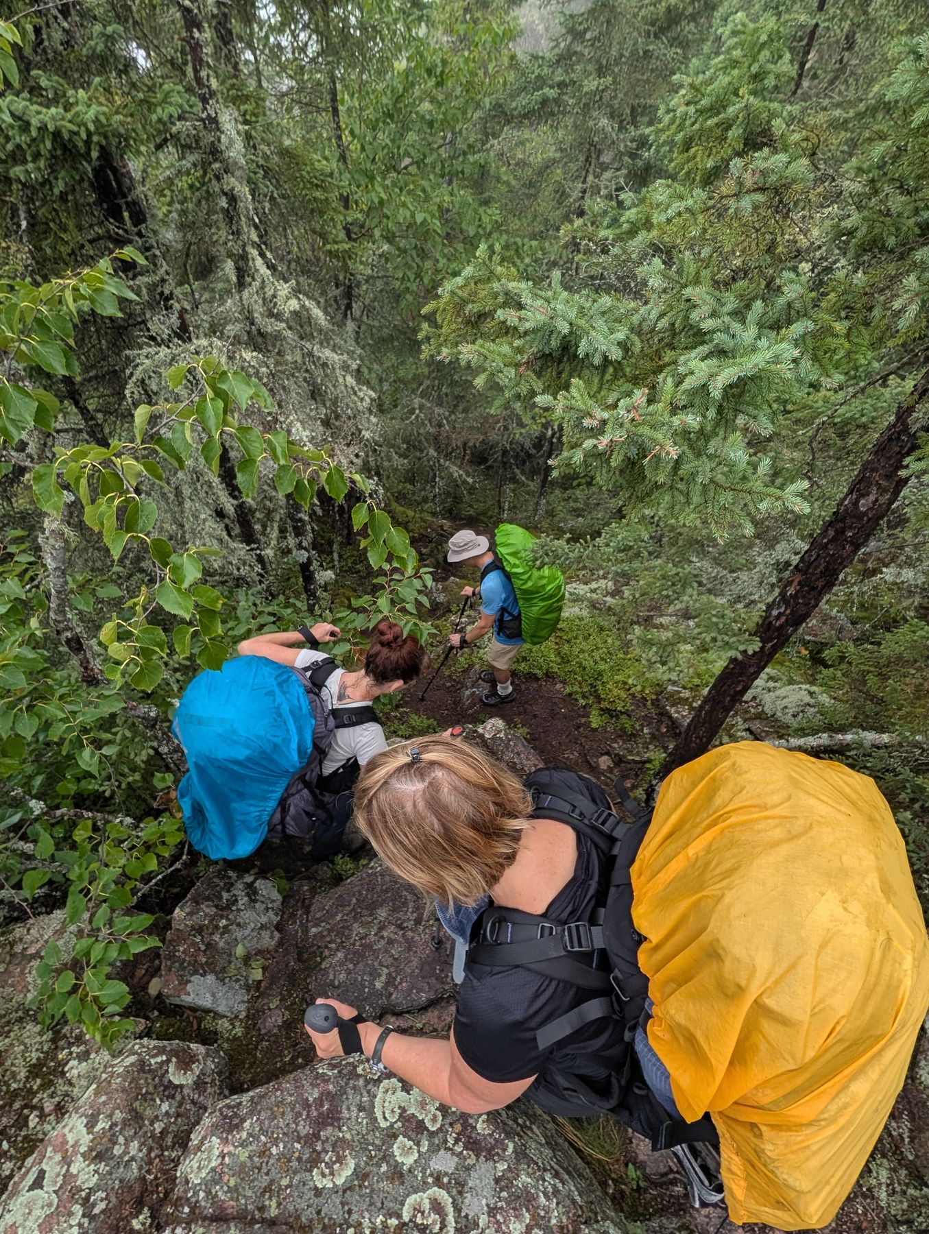 Picking a line down slick rock above Simons Harbour