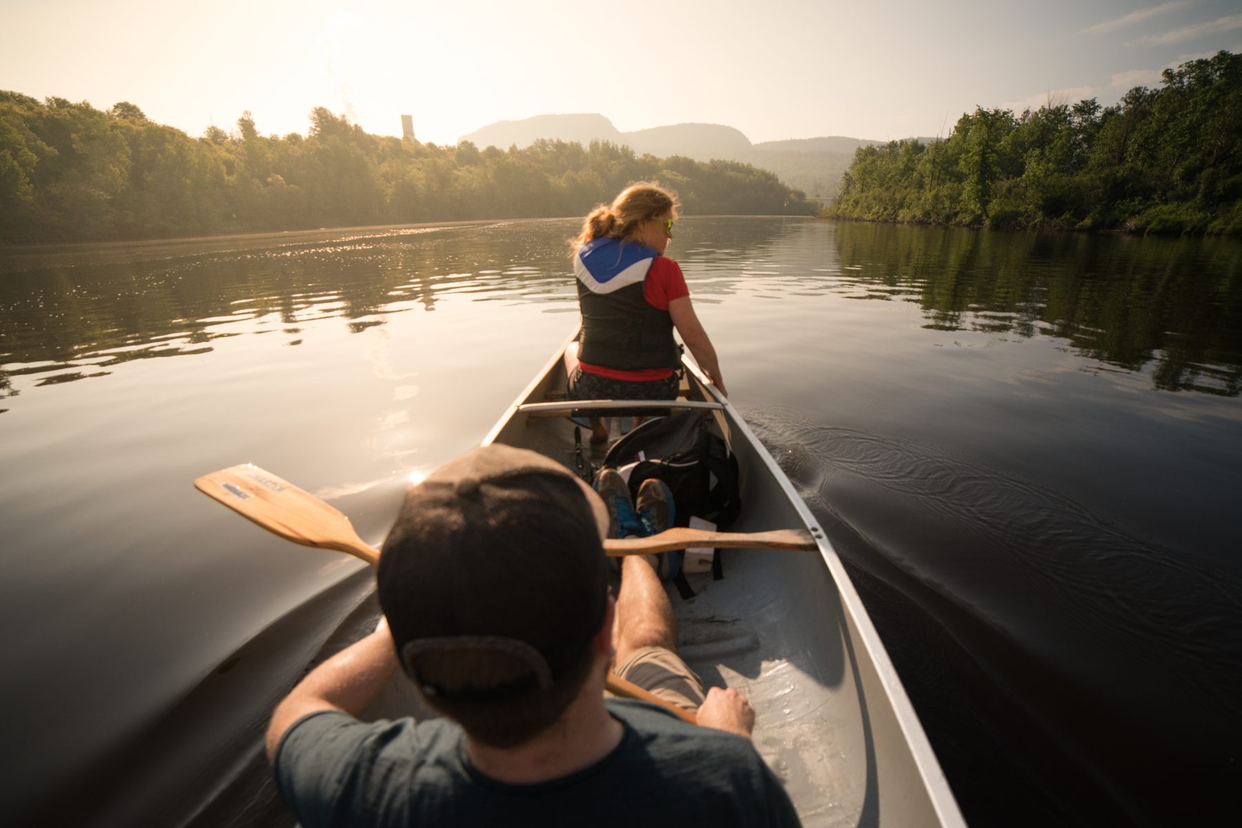 Paddling the river with the mill and the Giant in view